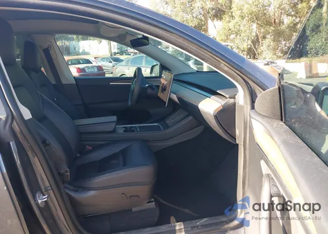 2023 Tesla Model Y Awd/Long Range Dual Motor All-Wheel Drive from USA, damaged, VIN 7SAYGAEE4PF609339